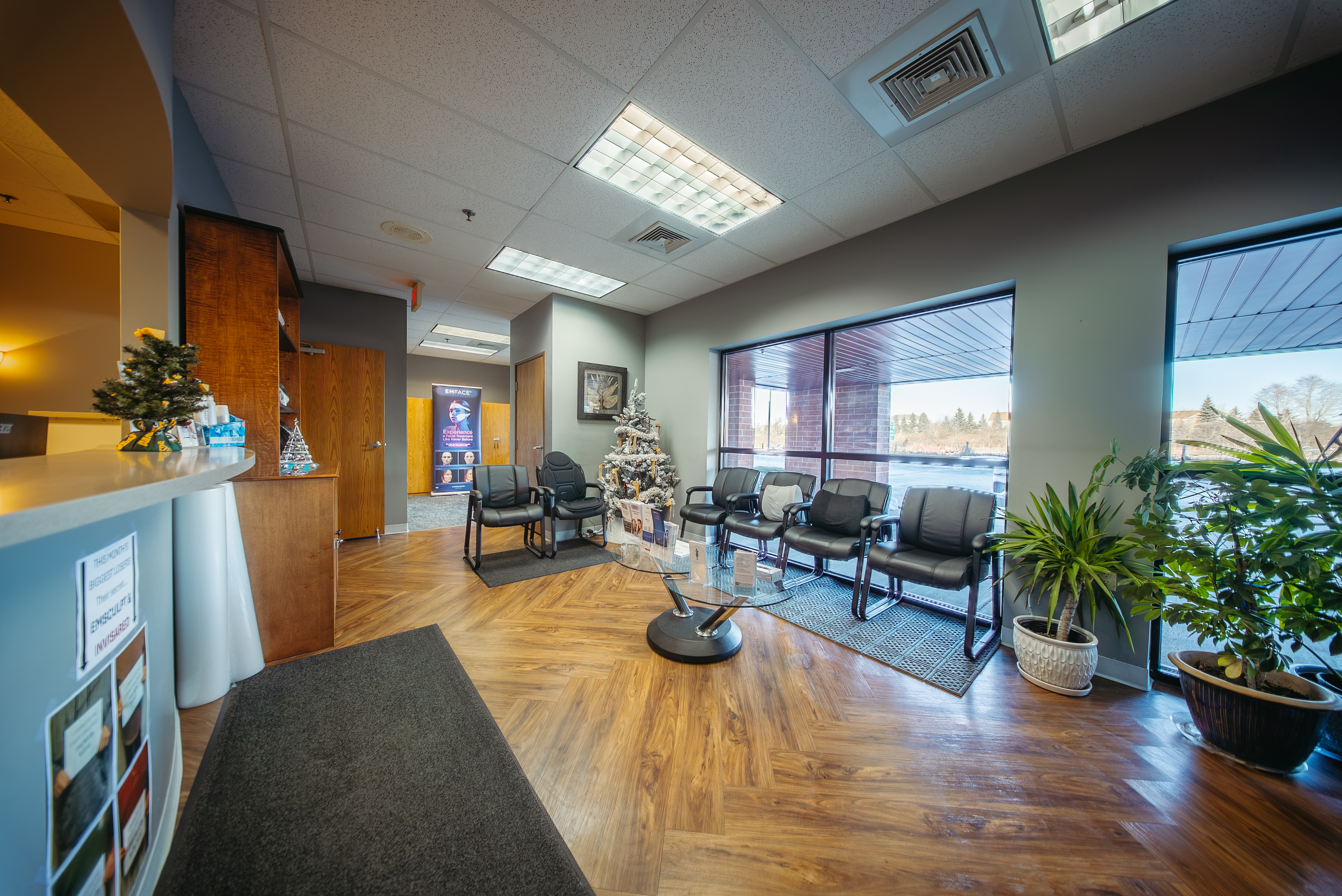 RiverCrest Health provider consulting warmly with a patient in a clean, modern clinic
